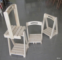 Kahden kerroksen puunkantotelineet. Hinta 15 €/kpl tai 25 € pari.